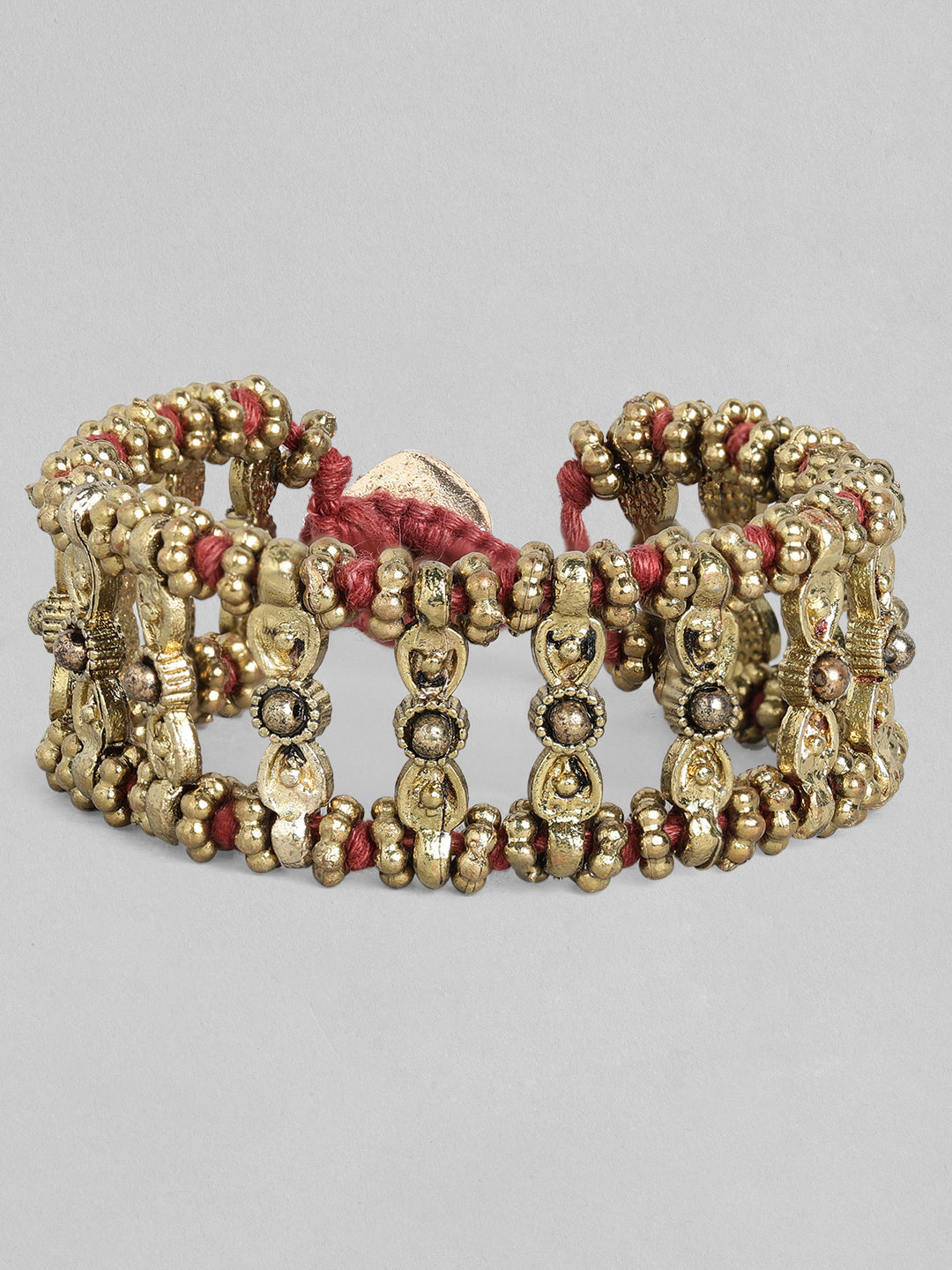 Rubans Voguish Antique Polished Red coloured Bracelet. Gold