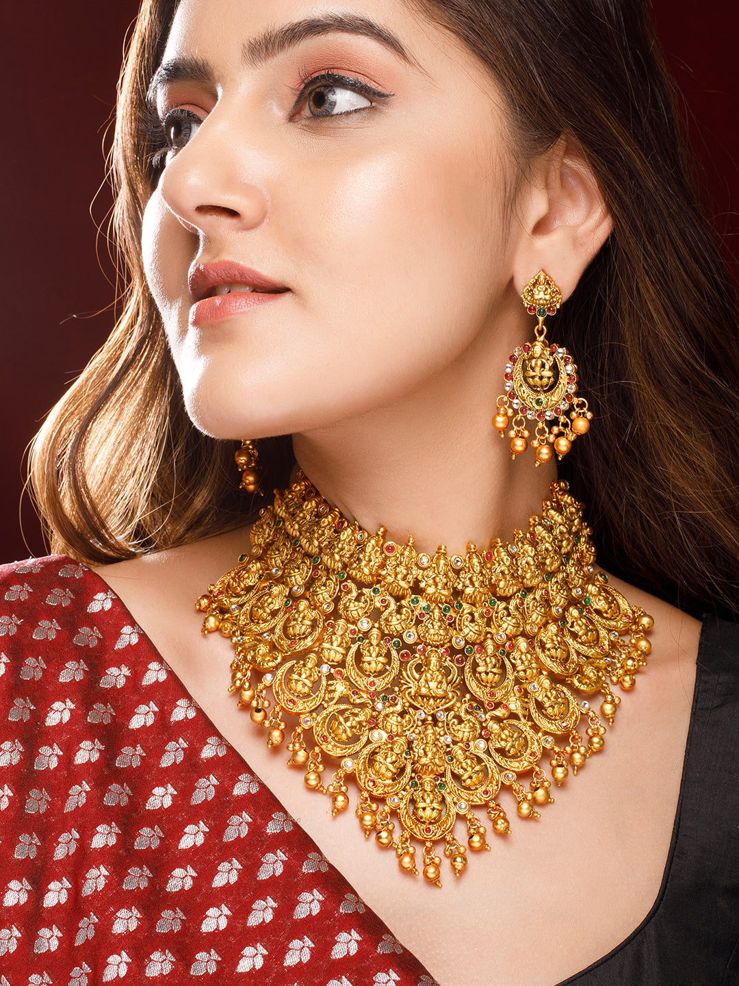 Rubans 22K Gold Plated Red, Green & White Stone Studded Lakshmi Motif Temple Jewellery Set Gold