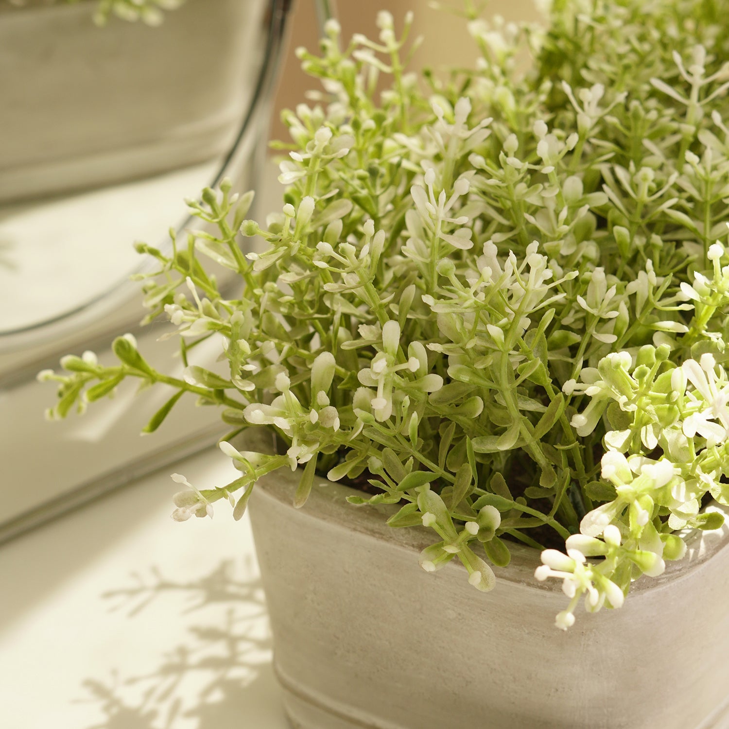 Green Faux Plant With Rectangular Cement Pot