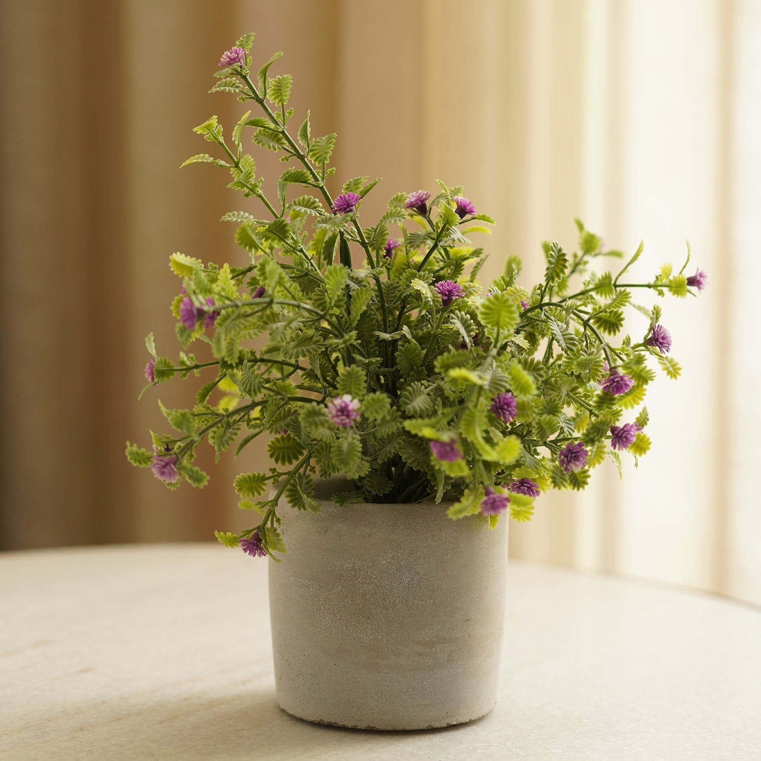 Purple Faux Spurflower with Cement Pot