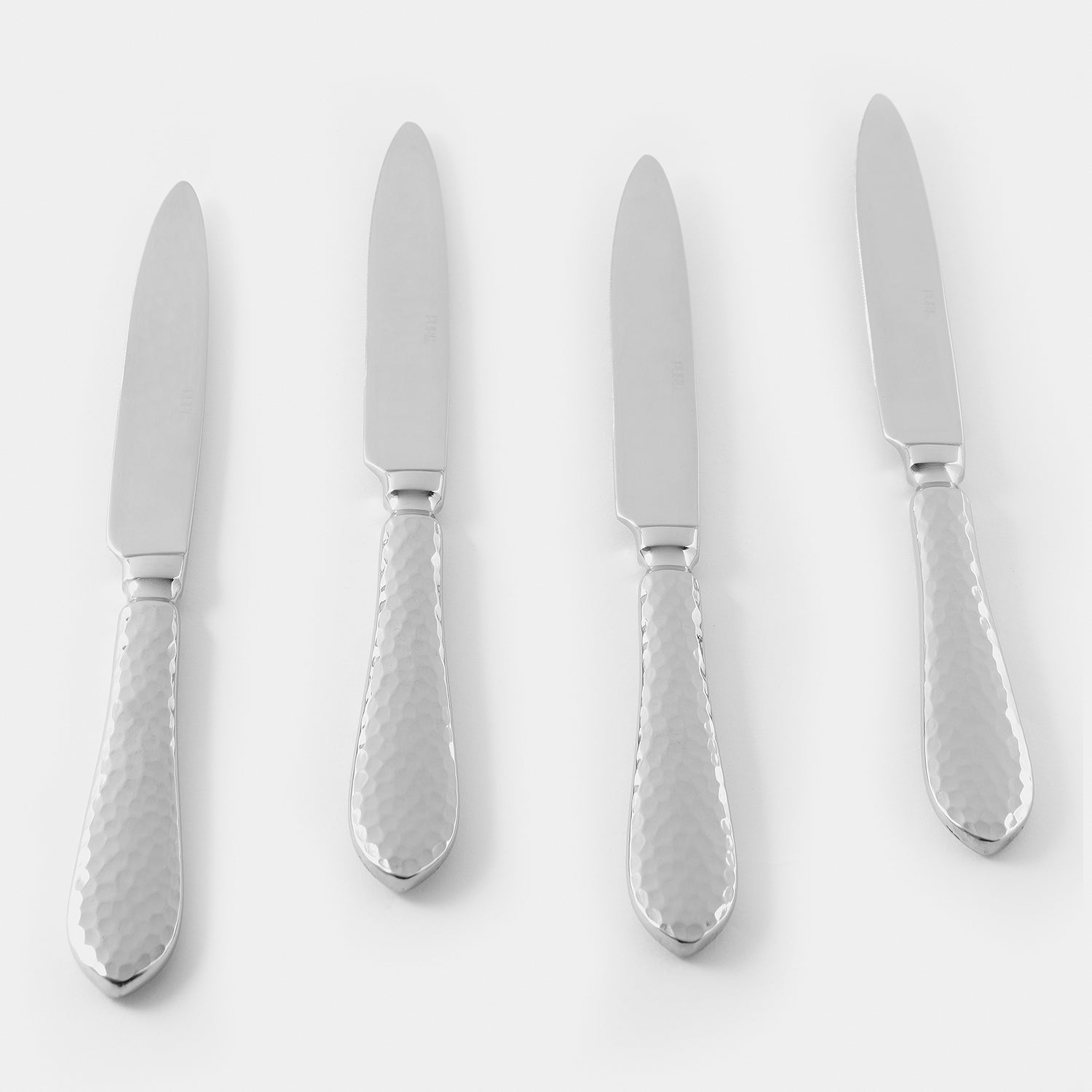 Set Of 4 Silver Hammered Dinner Knives