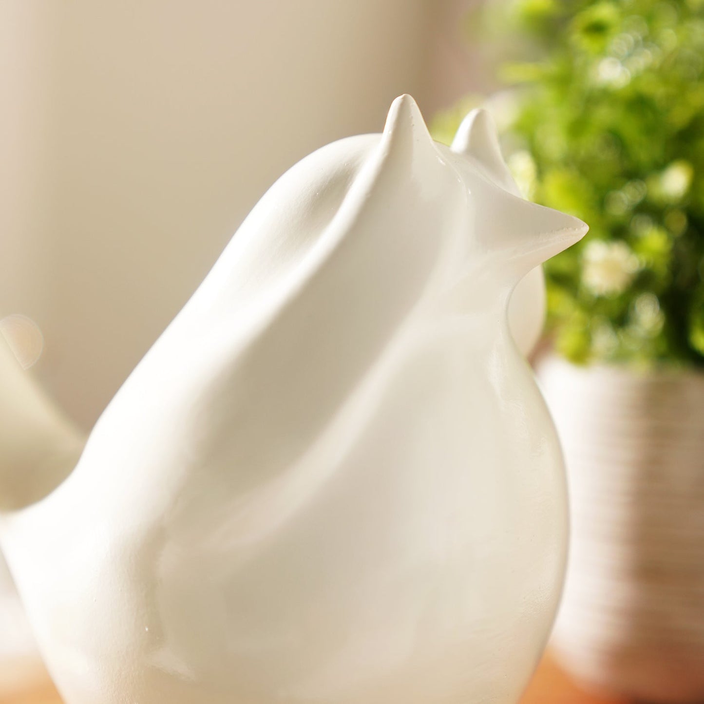 Ivory Polyresin Sparrow Figurine With Closed Eyes