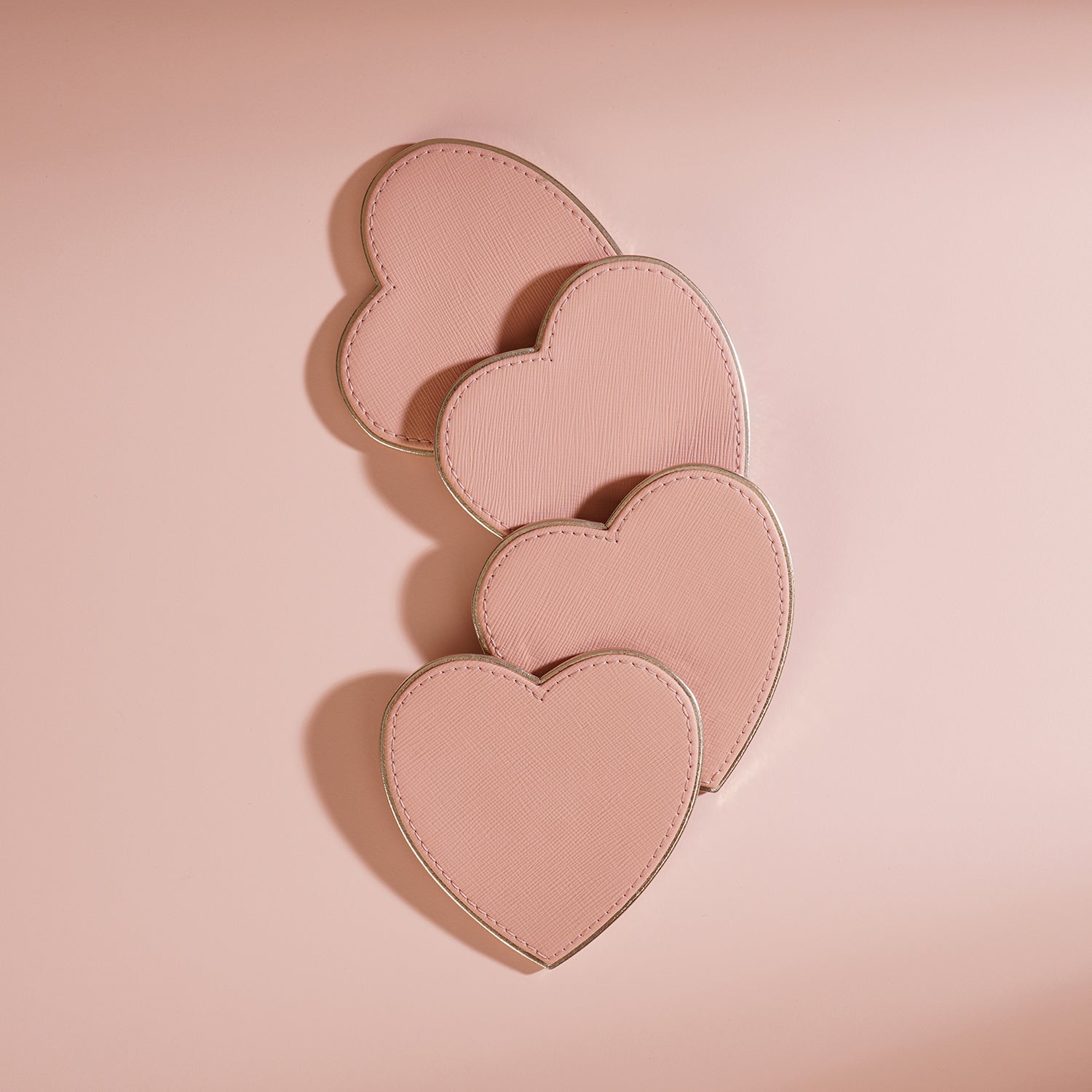 Set of 4 Pink Heart Shaped Faux Leather Coaster