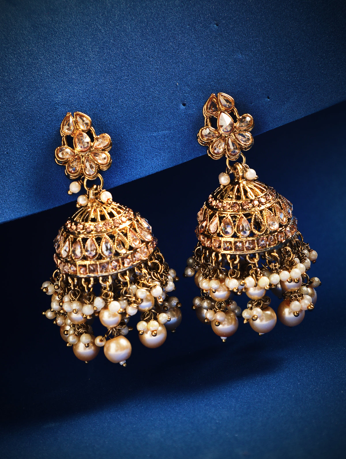 Rubans Gold Plated Handcrafted AD Studded & White Beads Jhumka Earrings Gold