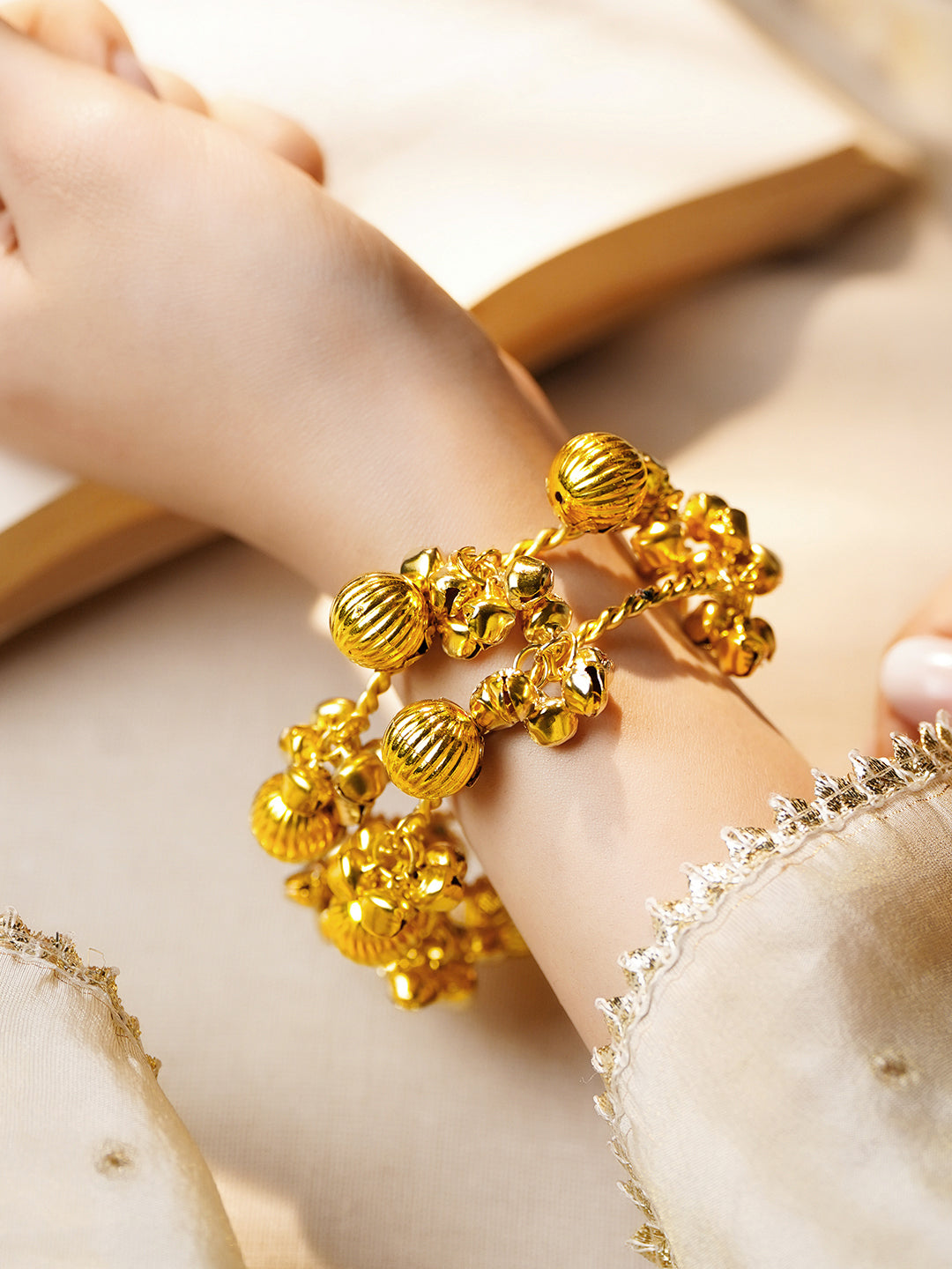 Gold Twisted Ghungroo Statement Bangles Length - One Size