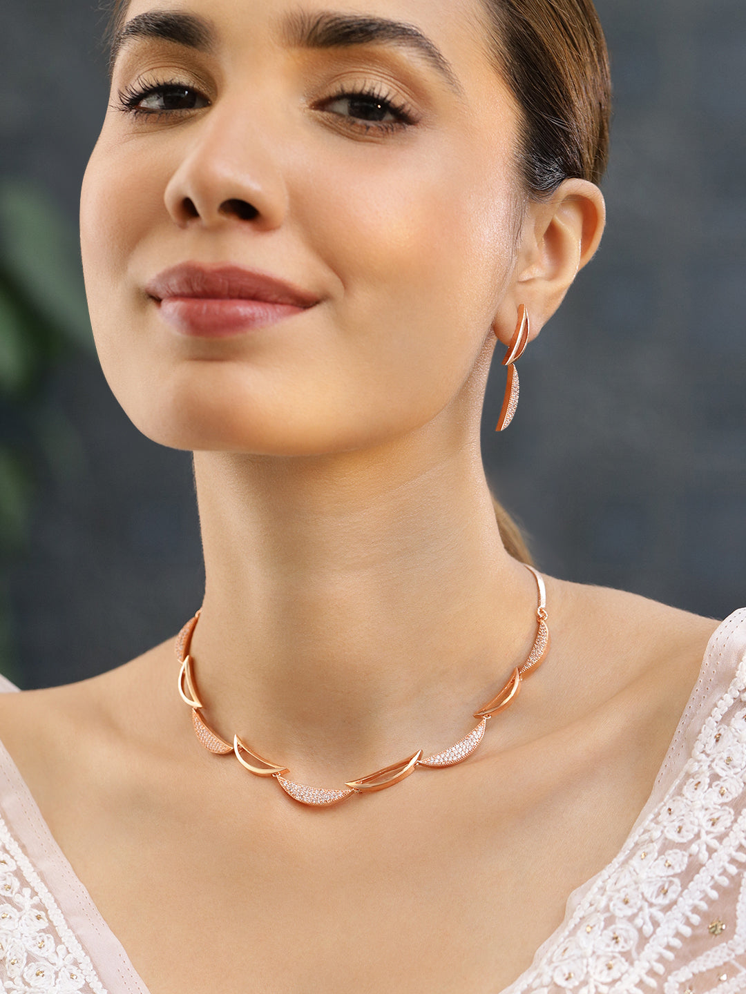 Rubans Rose Gold Plated Zirconia Stone Studded Handcrafted Necklace Set. Rose Gold