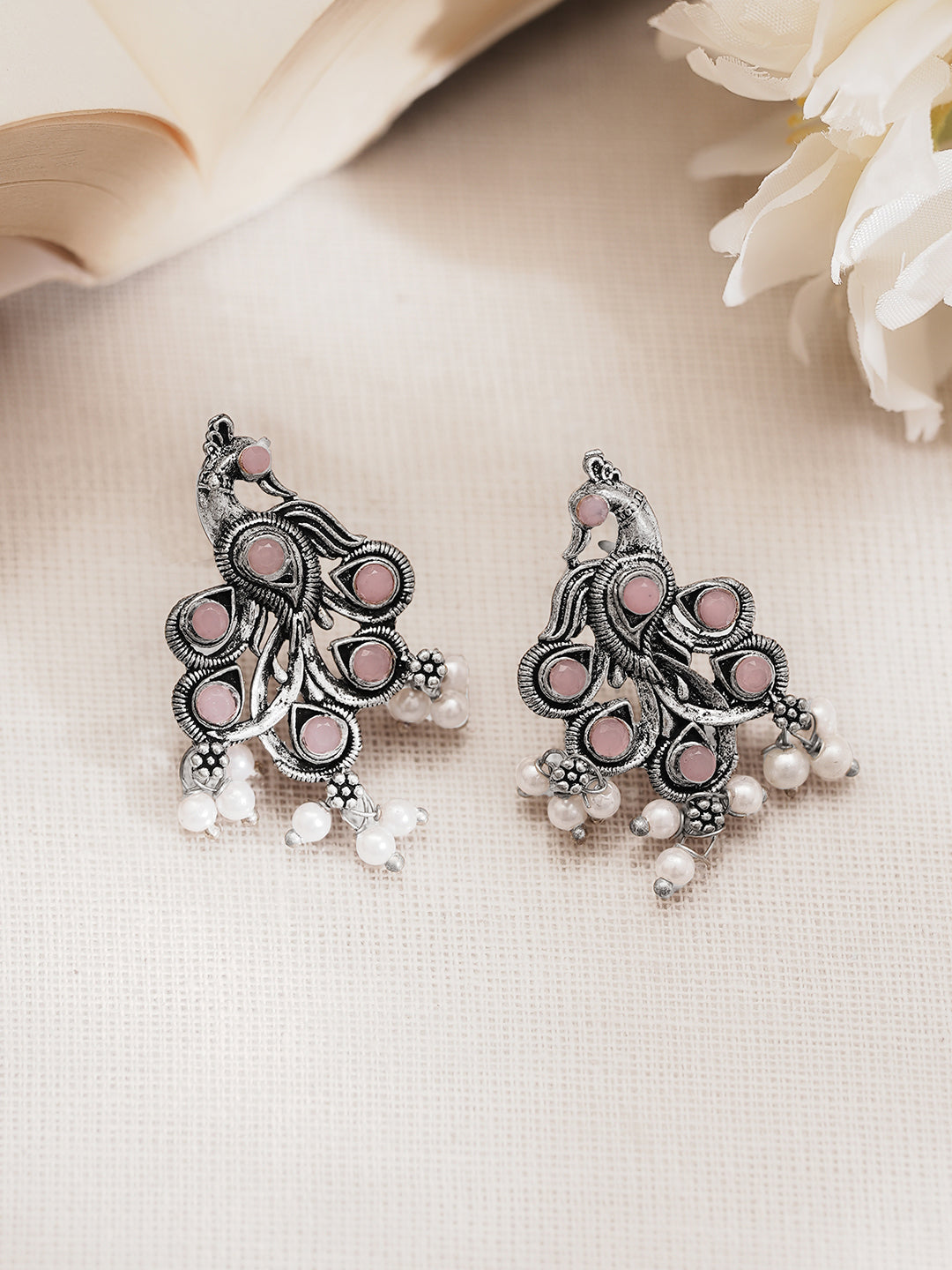 Oxidised Pastel Pink Peacock Stud Earrings フリーサイズ