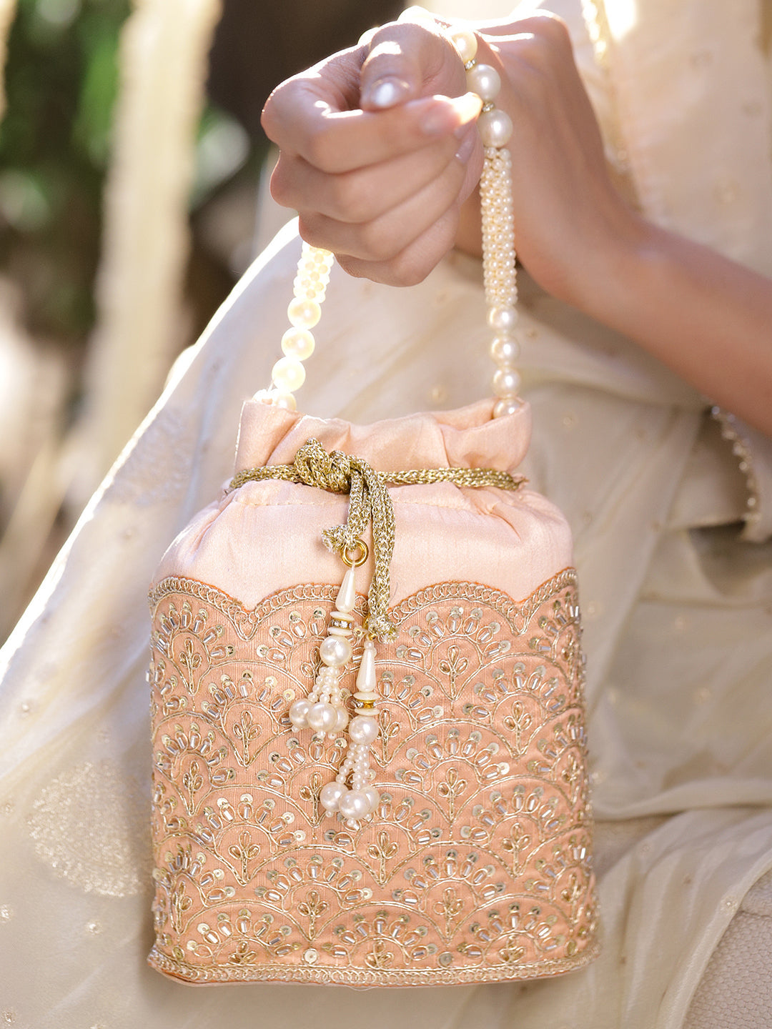 Women Peach Fabric Potli Bag with Golden Embroidery, White Stones & Pearl Tassel Handle フリーサイズ