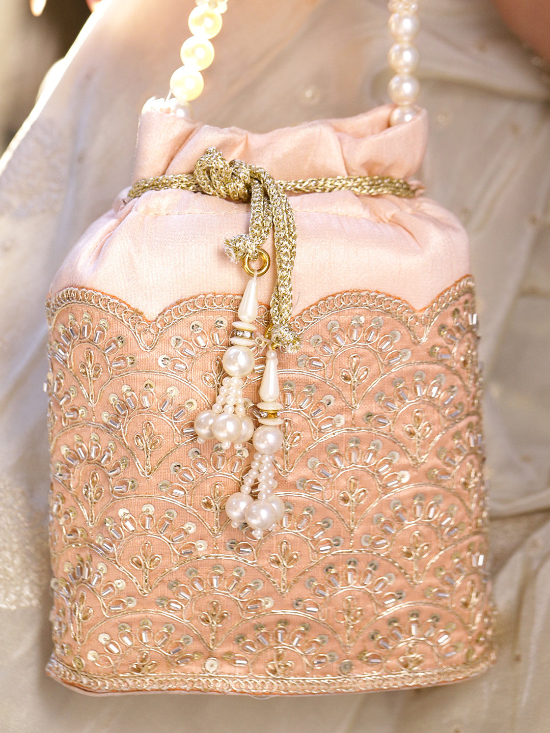 Women Peach Fabric Potli Bag with Golden Embroidery, White Stones & Pearl Tassel Handle フリーサイズ