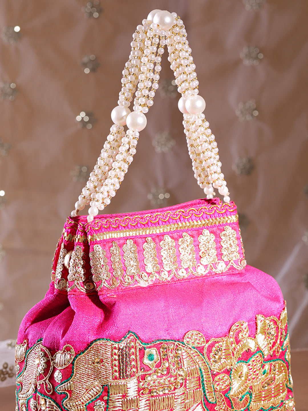 Rubans Pink Silk Potli Bag with Pearl Handle and Intricate Elephant Motif Embroidery Pink