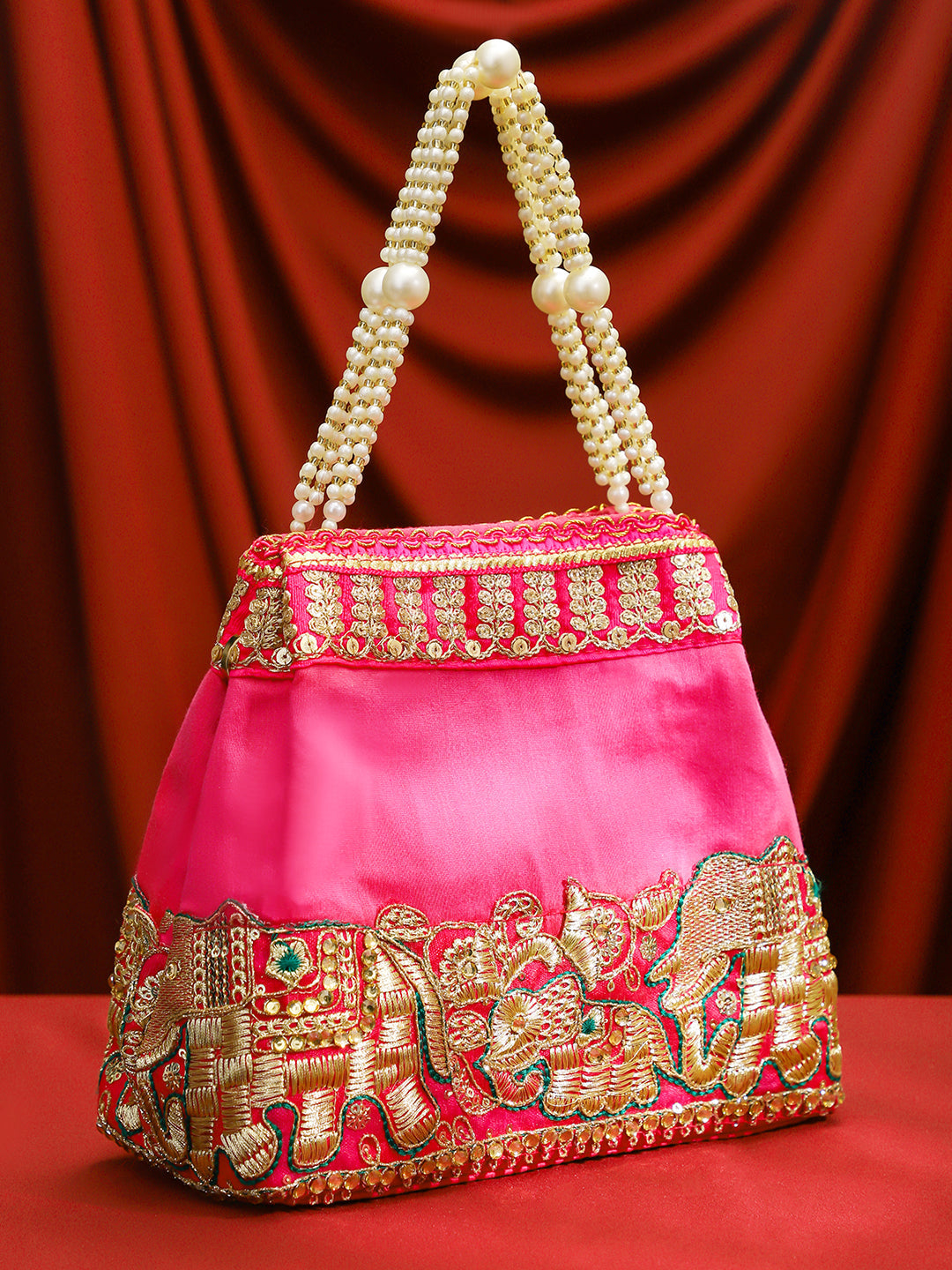 Rubans Pink Silk Potli Bag with Pearl Handle and Intricate Elephant Motif Embroidery Pink