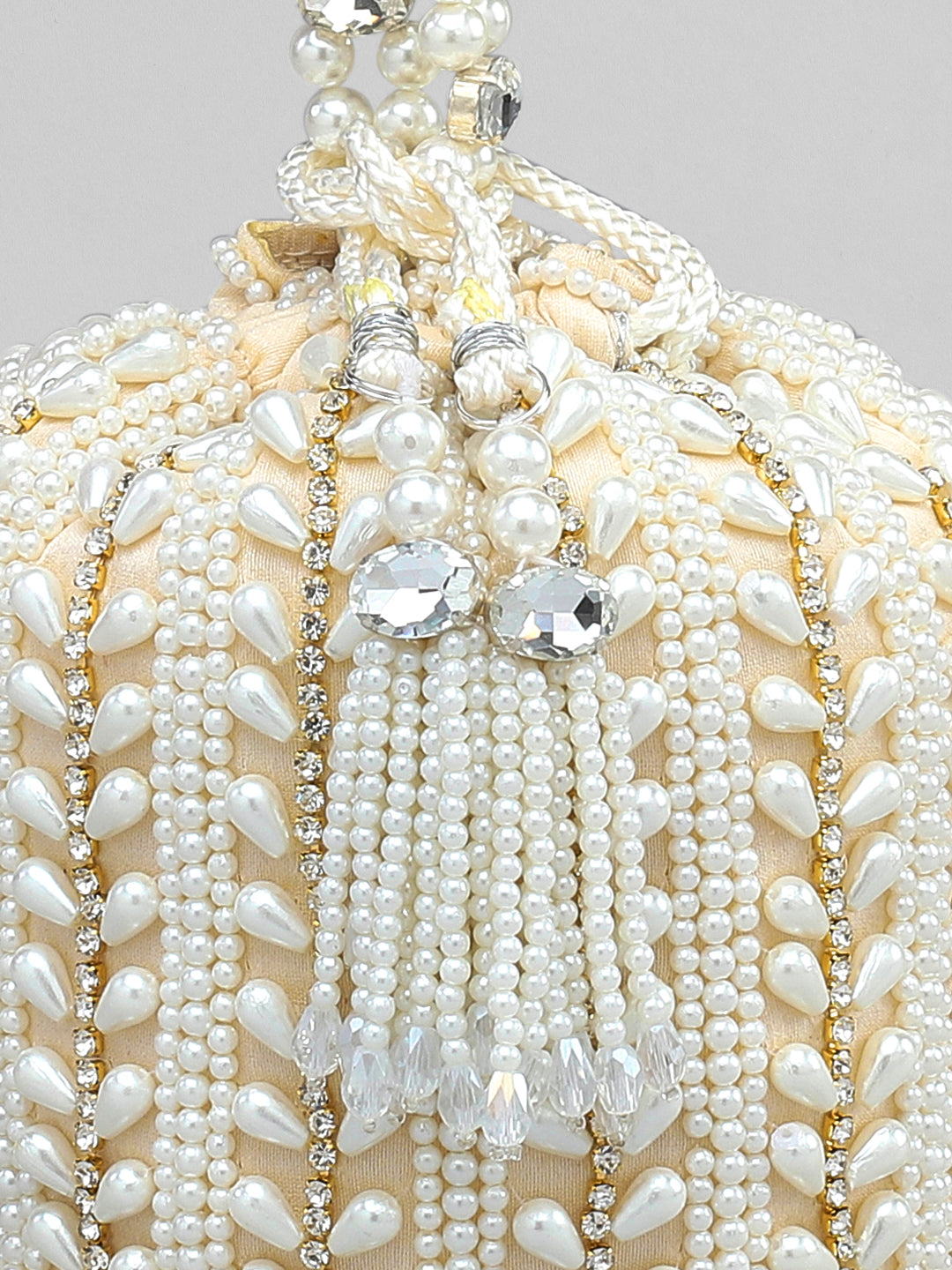 Rubans Off White Coloured Potli Bag With Golden Embroided Design And Pearls. Off White