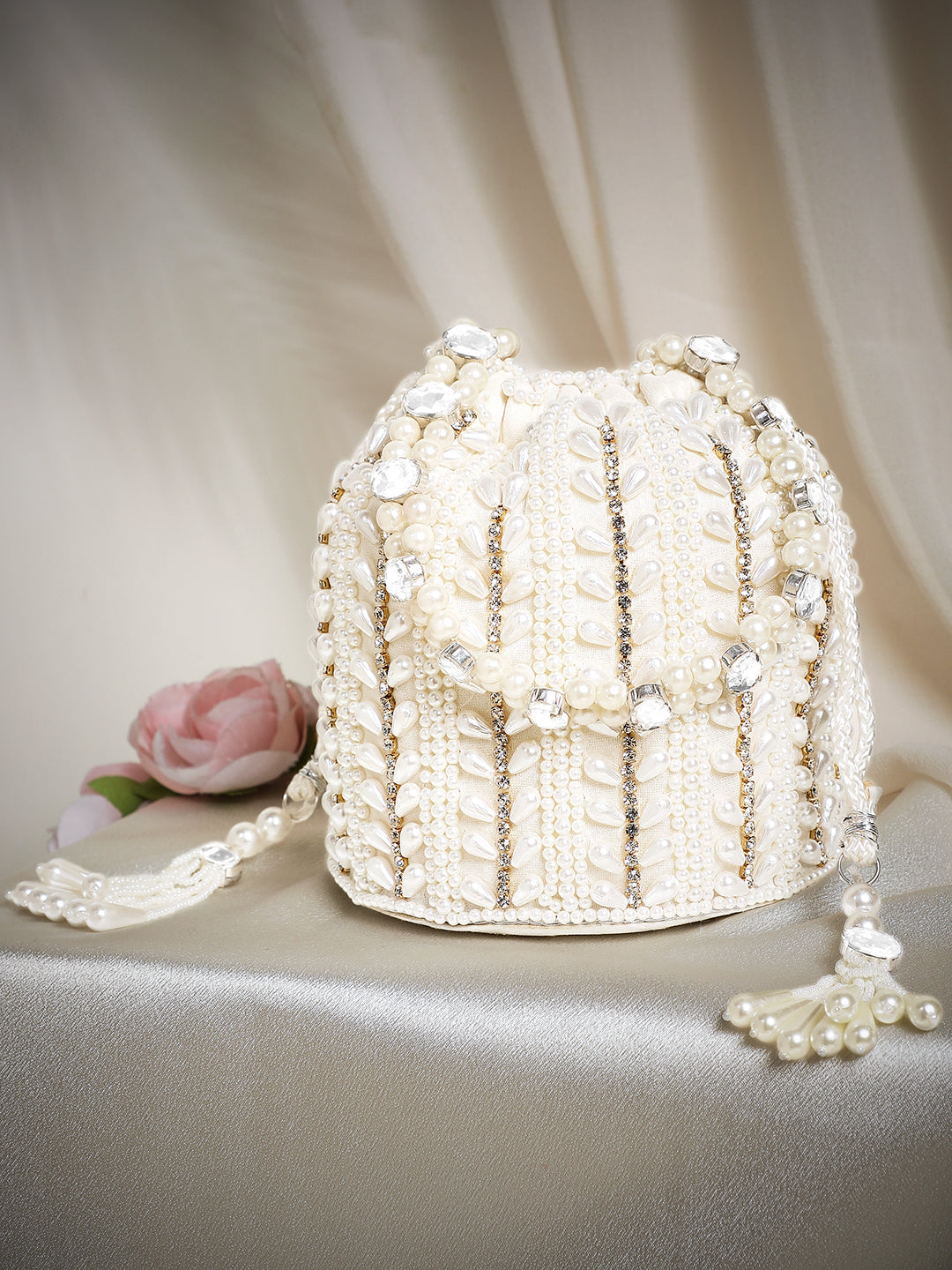 Rubans Off White Coloured Potli Bag With Golden Embroided Design And Pearls. Off White