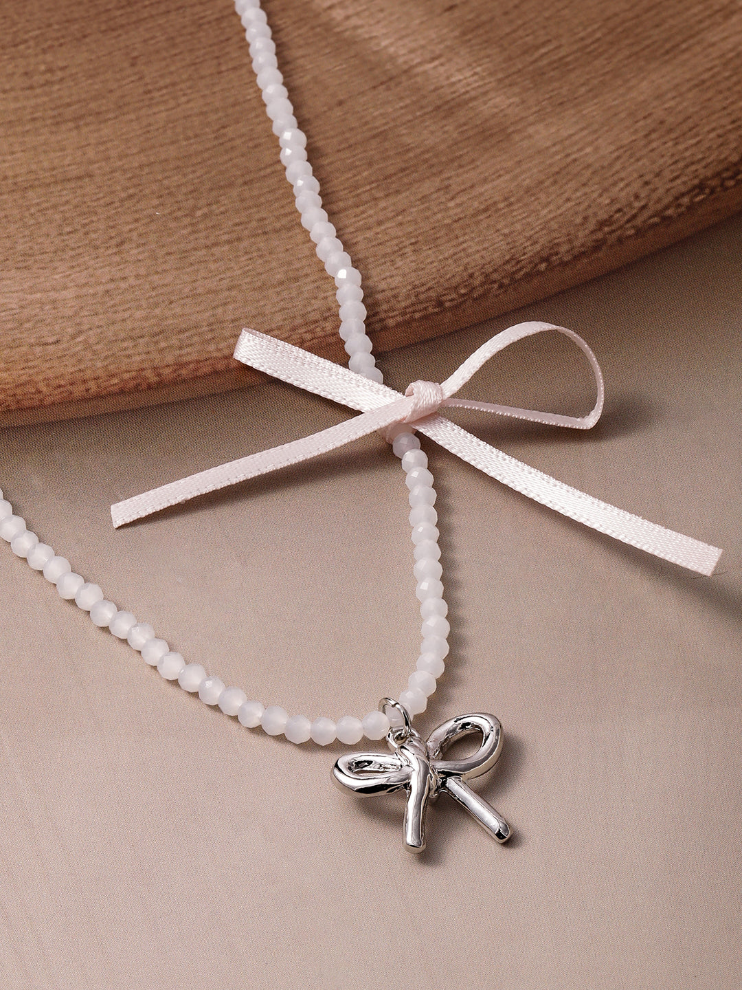 Chic Bow Pendant with Pearl & Ribbon Charm Silver
