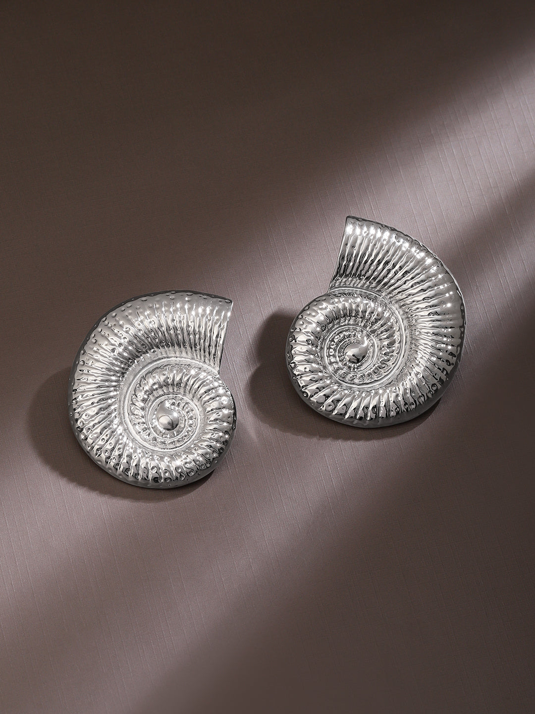Gleaming Spiral Silver Shell Studs Silver