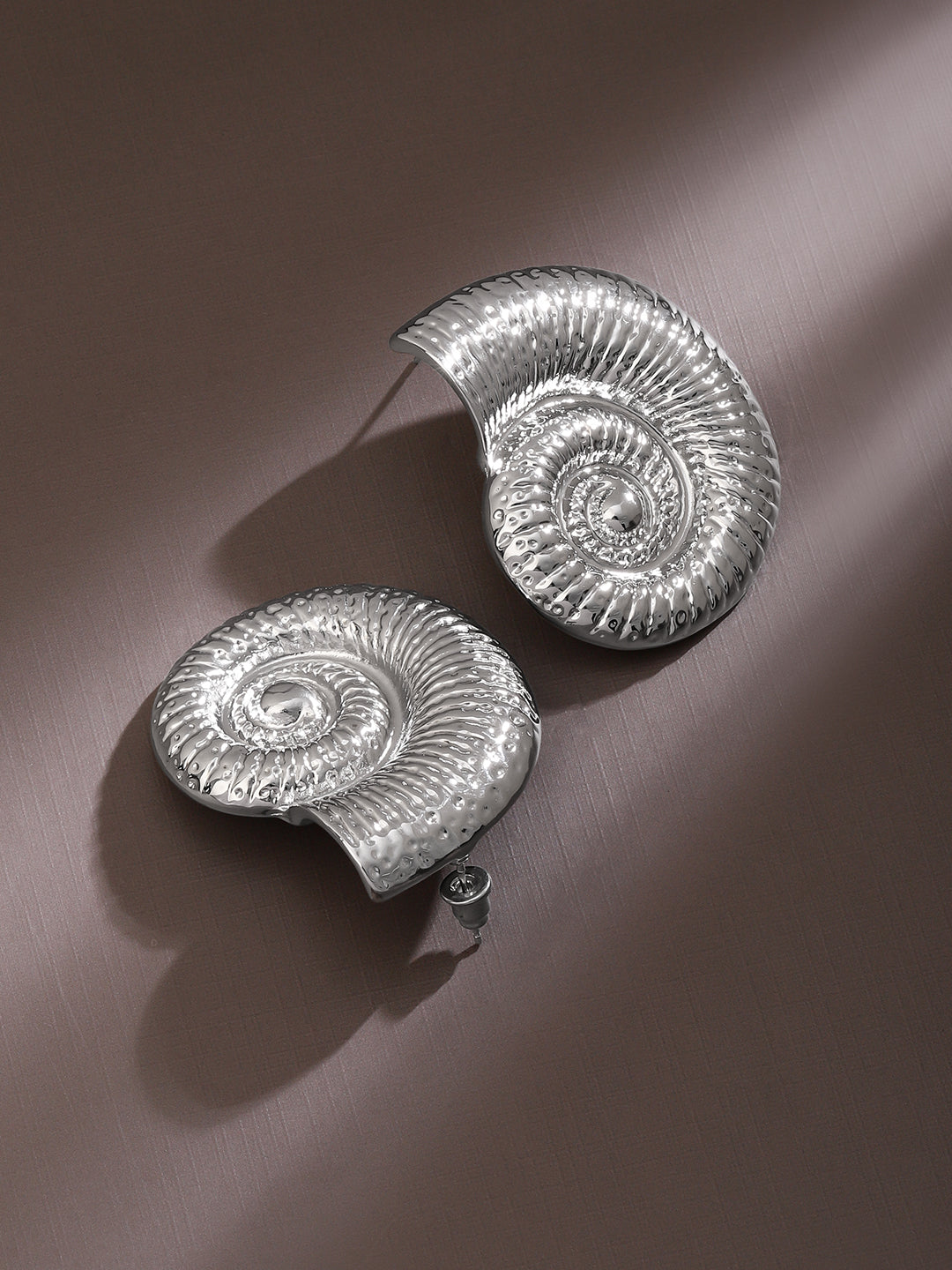 Gleaming Spiral Silver Shell Studs Silver