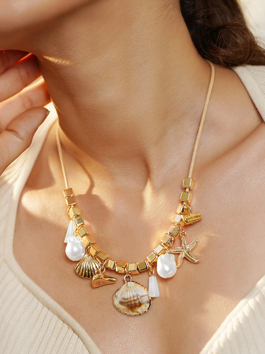 【Rubans】 Gold Toned Multi-Charm Necklace｜ゴールドトーン マルチチャーム ネックレス（ステンレススチール）