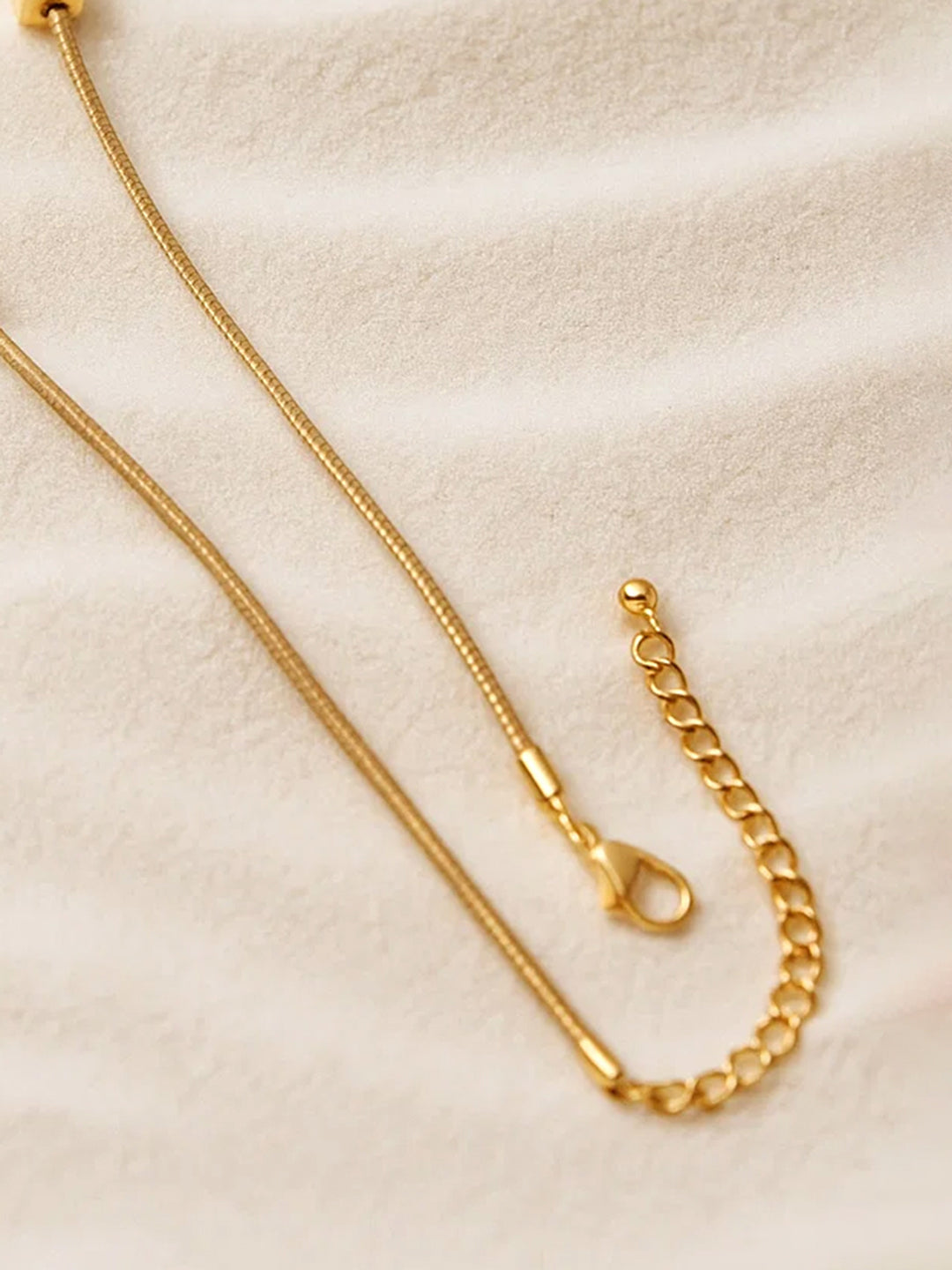 【Rubans】 Gold Toned Multi-Charm Necklace｜ゴールドトーン マルチチャーム ネックレス（ステンレススチール）