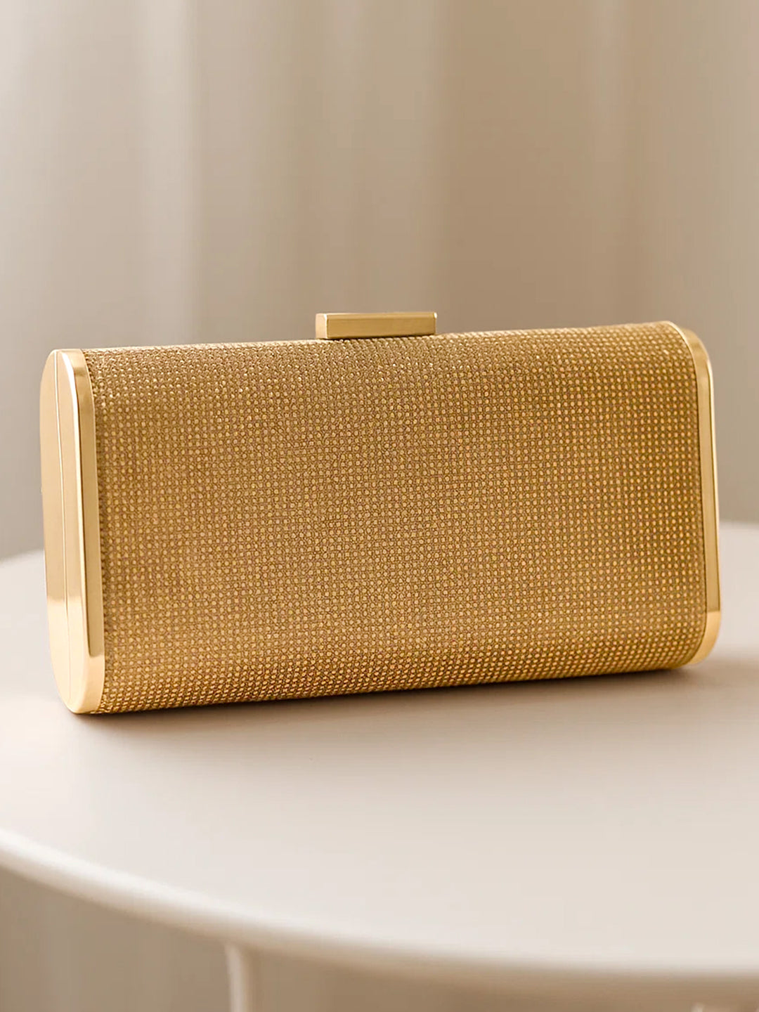 Festive Glow Structured Gold Clutch フリーサイズ
