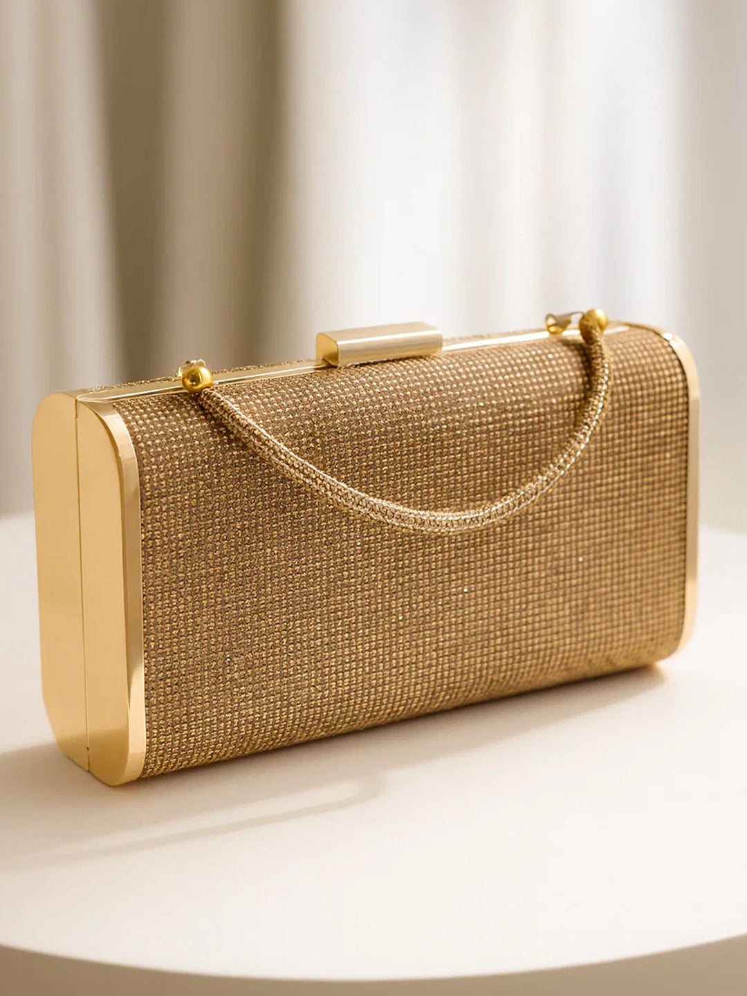Festive Glow Structured Gold Clutch フリーサイズ