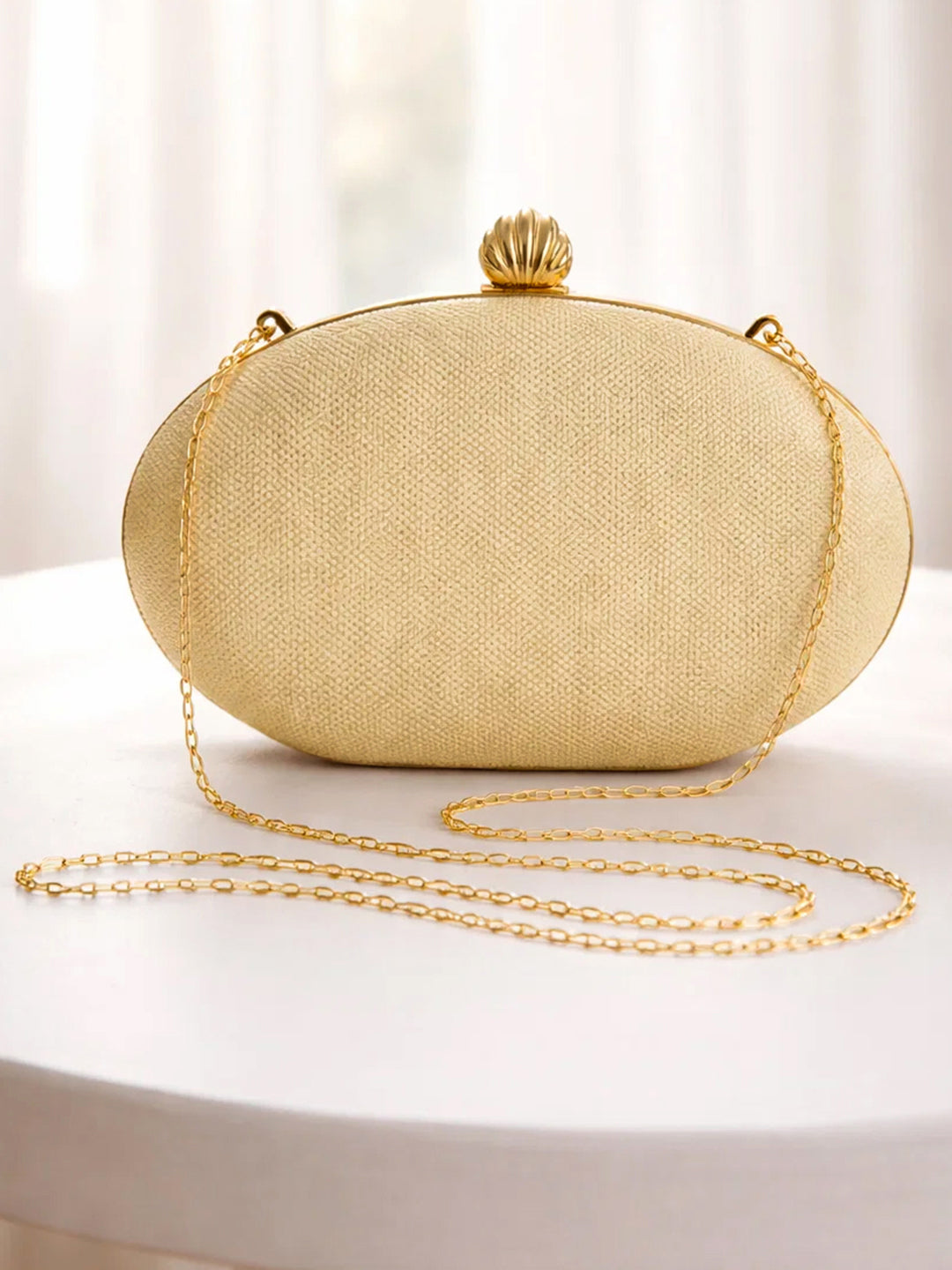 Sculpted Gold Metallic Party Clutch フリーサイズ