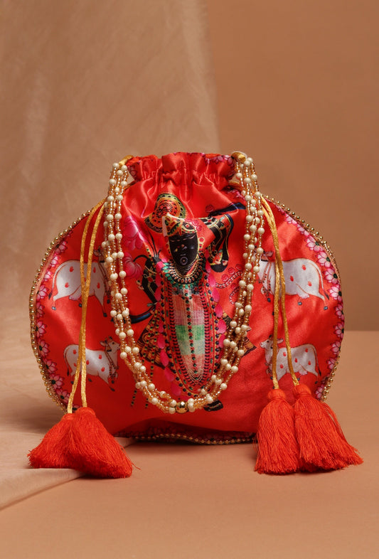Shreenath's Radiant Orange Potli with White Moti