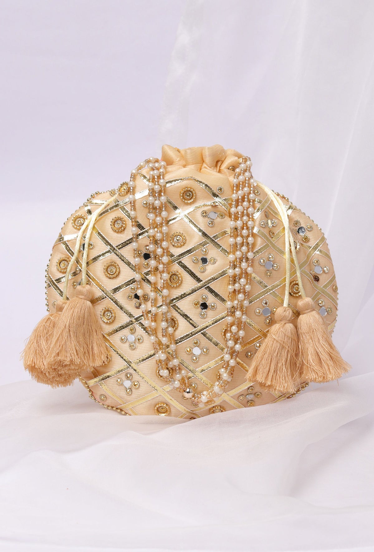 Glimmering Golden Potli with Glass Mirror Work