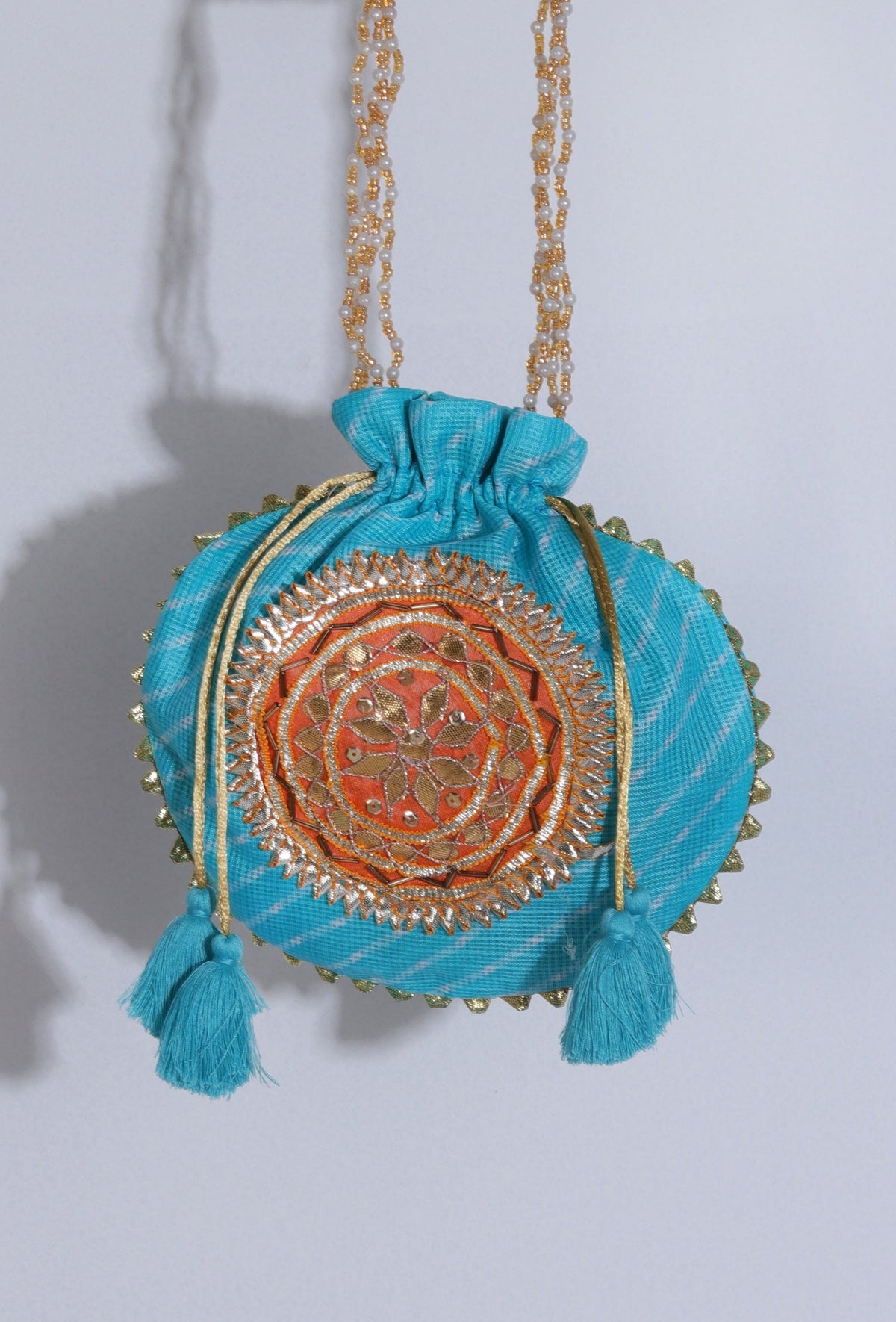 Radiant Sky Blue Potli with Gotapatti Detail