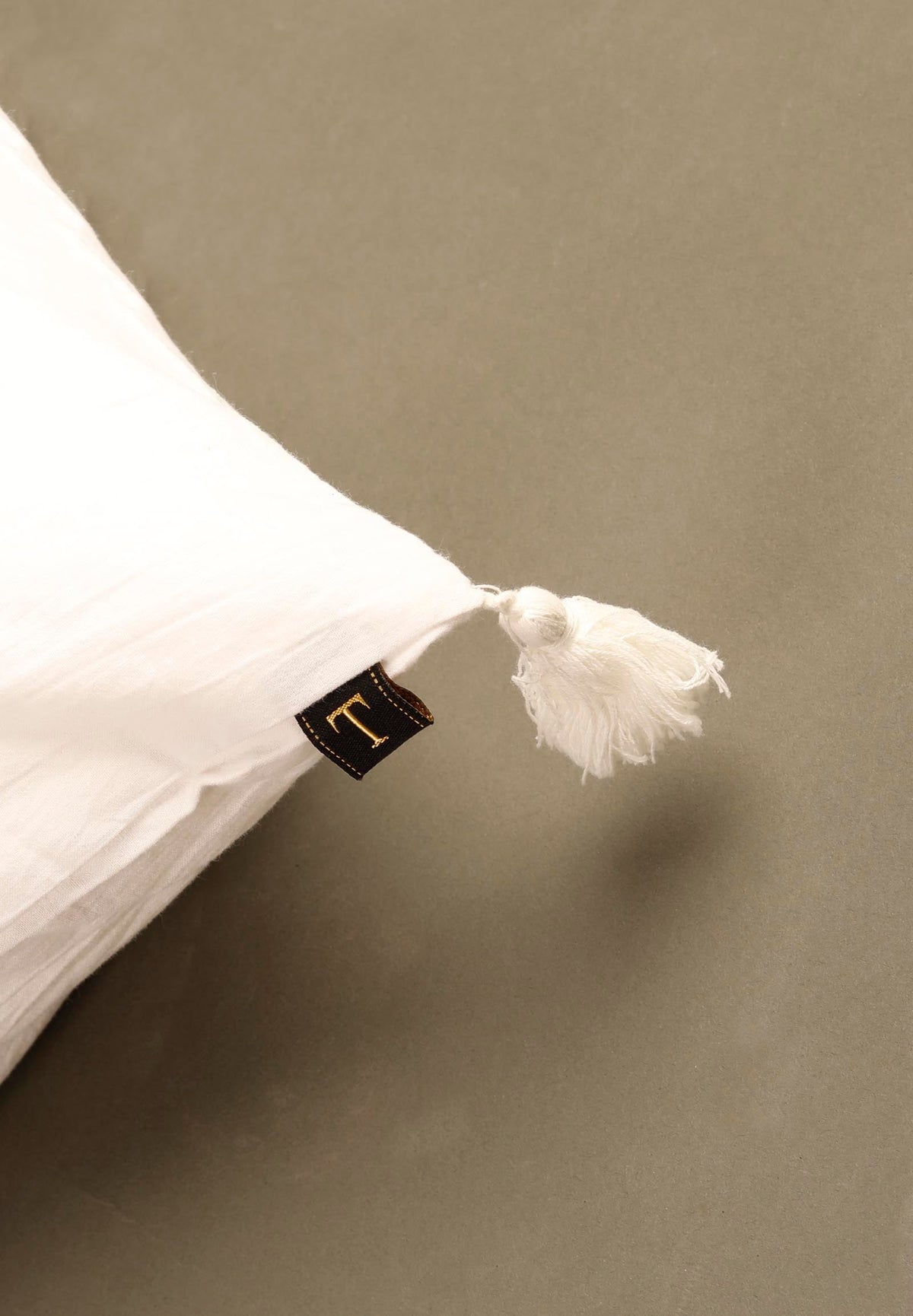 White Single Edged Cushion Cover With Tassels