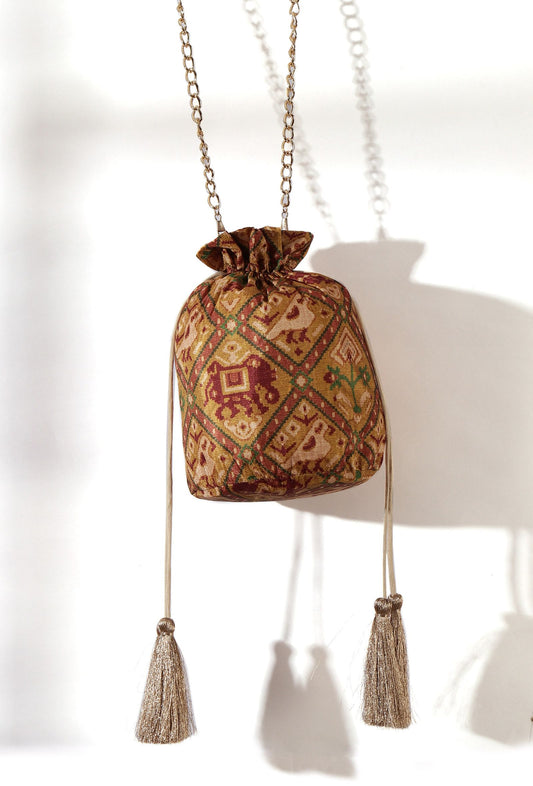 Chhaya Golden & Multi Silk Patola Print Potli With Tassels