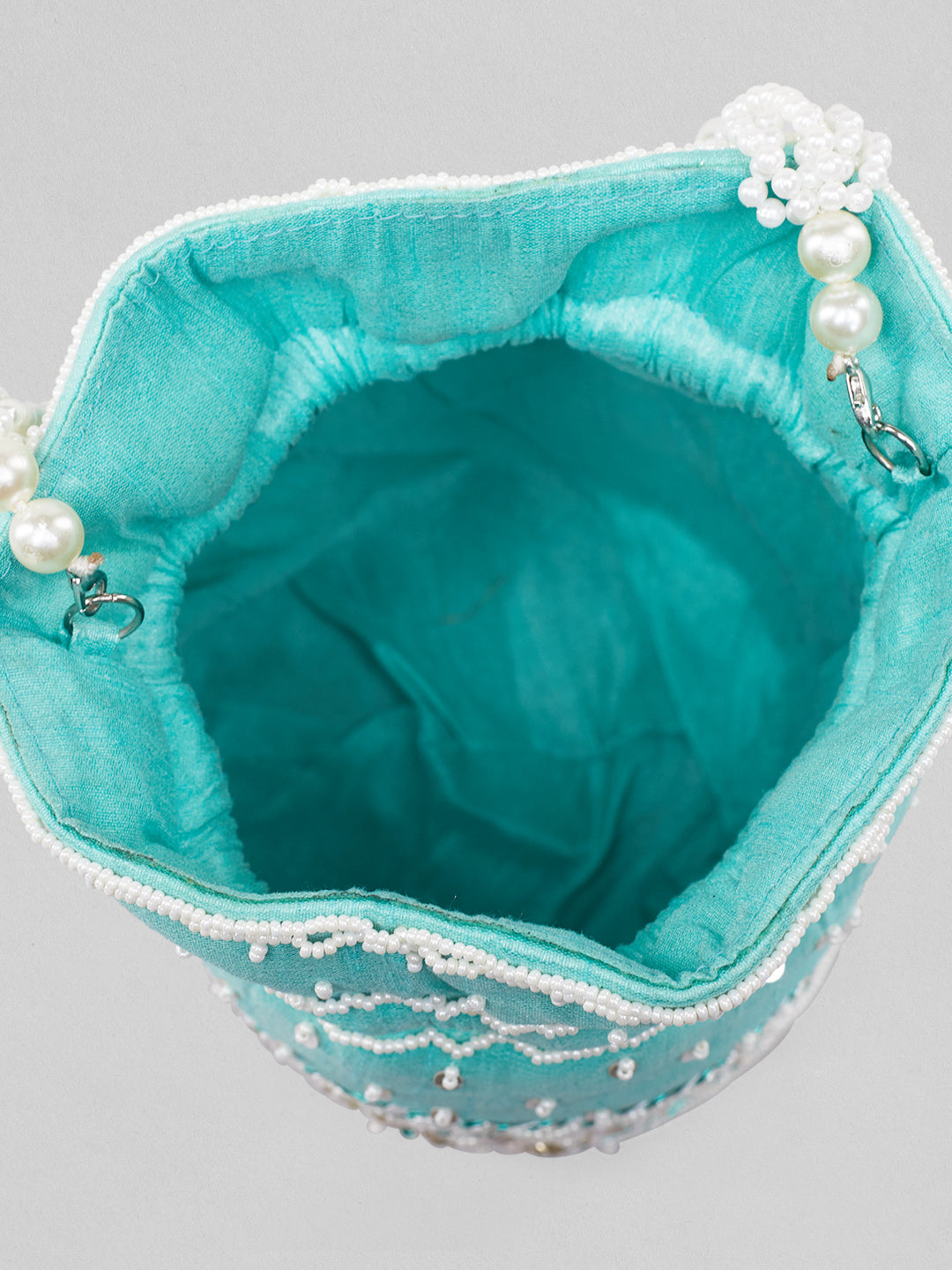 Rubans Mint Coloured Potli Bag With Golden And White Embroided Design. Turquoise Blue