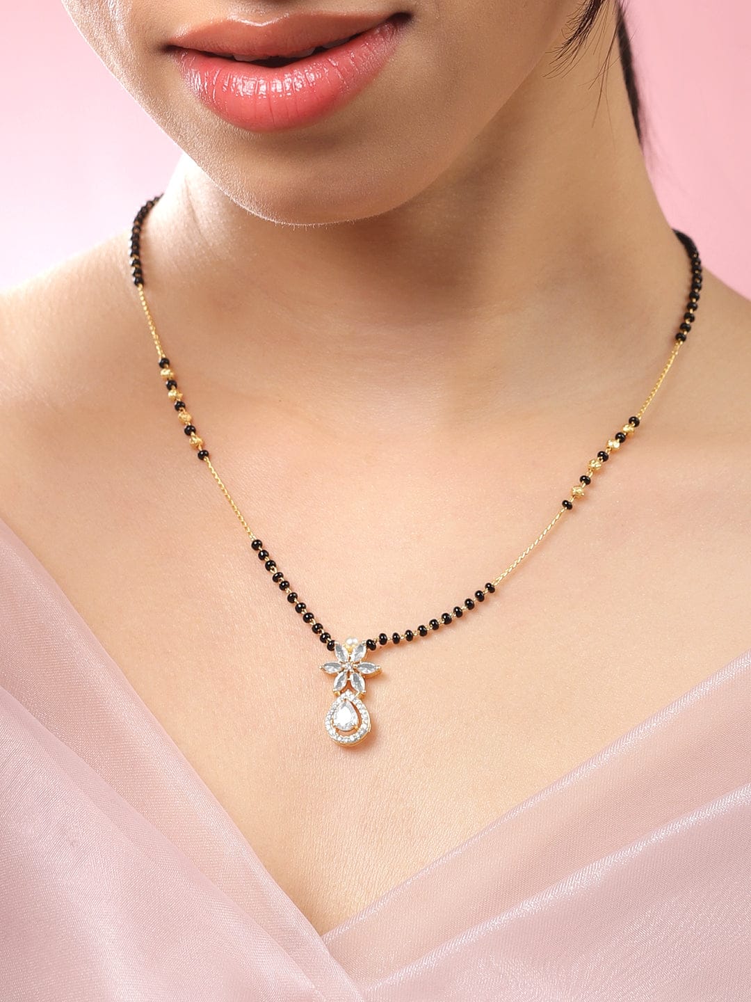 Rubans 18K Gold-Plated White Cubic Zirconia Studded Floral & Teardrop Pendant Mangalsutra with Black & Gold Beaded Chain Gold