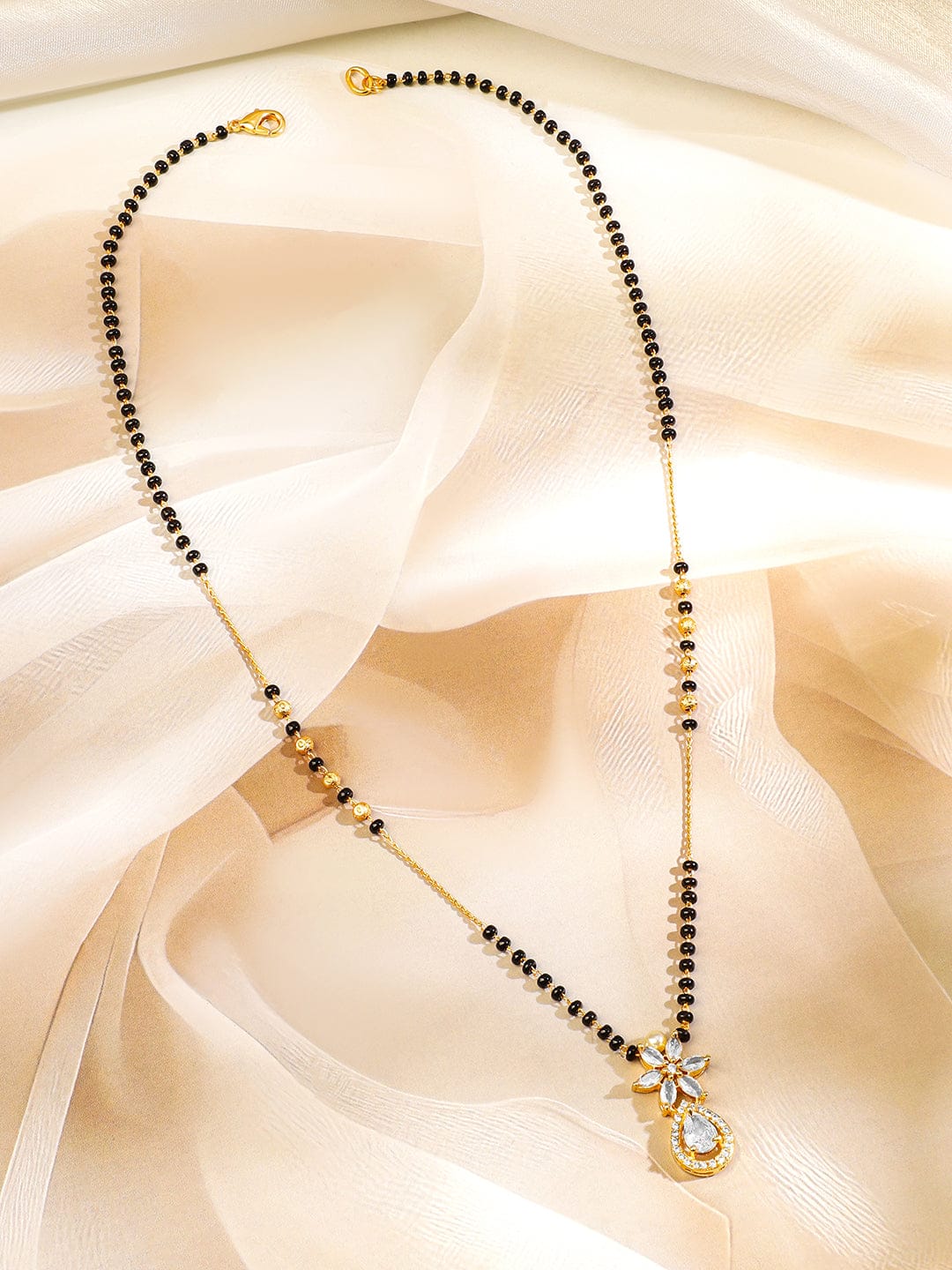 Rubans 18K Gold-Plated White Cubic Zirconia Studded Floral & Teardrop Pendant Mangalsutra with Black & Gold Beaded Chain Gold