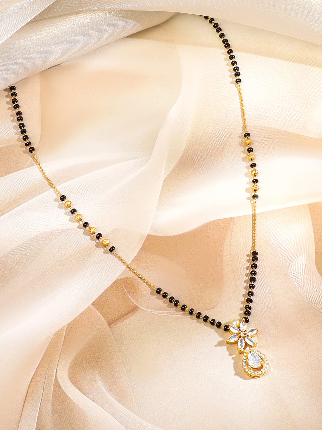 Rubans 18K Gold-Plated White Cubic Zirconia Studded Floral & Teardrop Pendant Mangalsutra with Black & Gold Beaded Chain Gold
