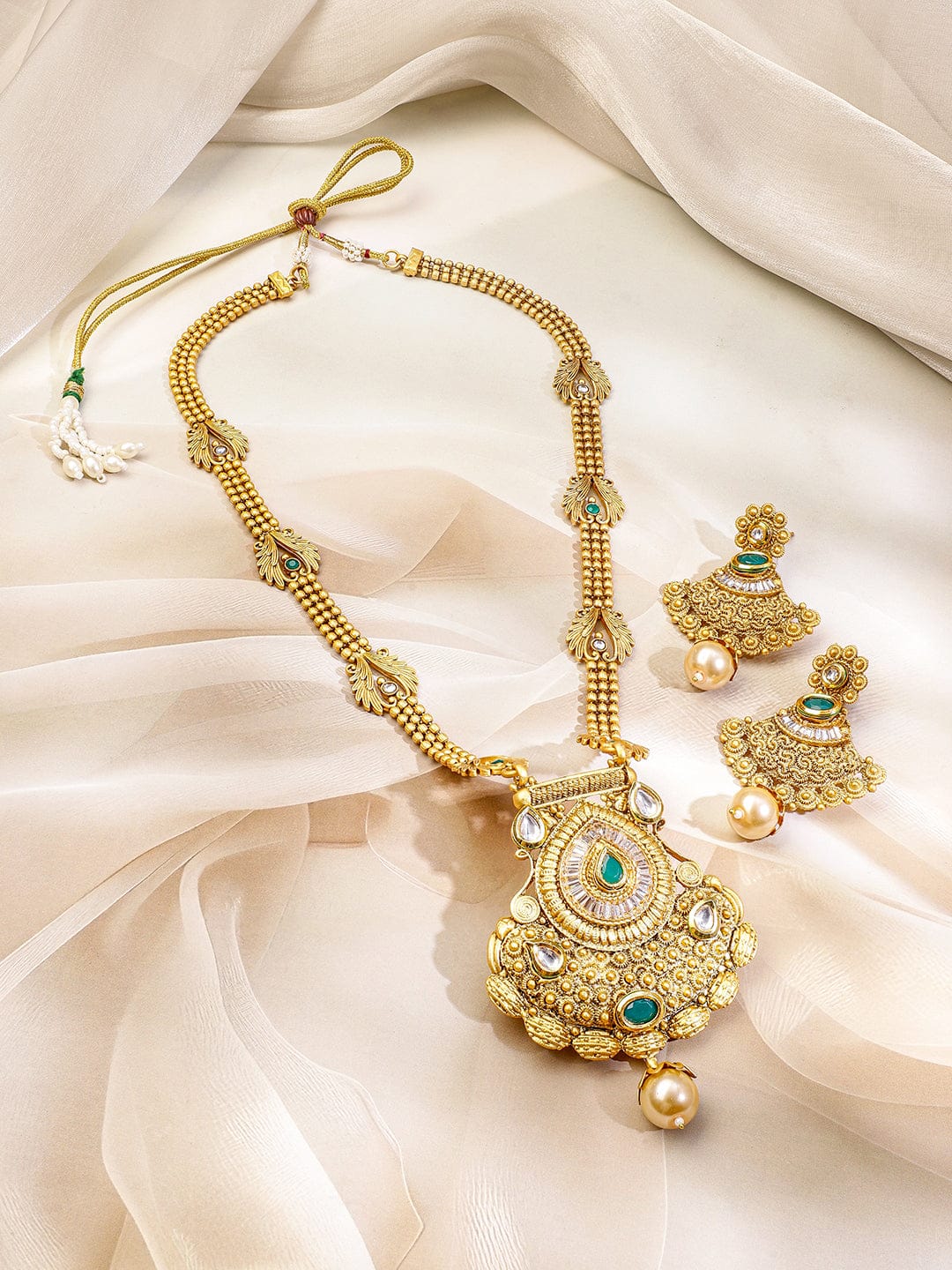 Emerald Studded Golden Necklace Set Green
