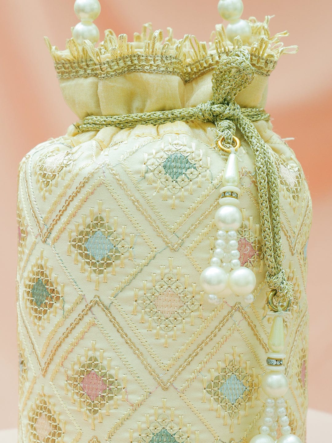 Rubans Cream Potli Bag with Multicolor Pastel Embroidery, Pearl Beaded Handle and Golden Tassel Detailing フリーサイズ
