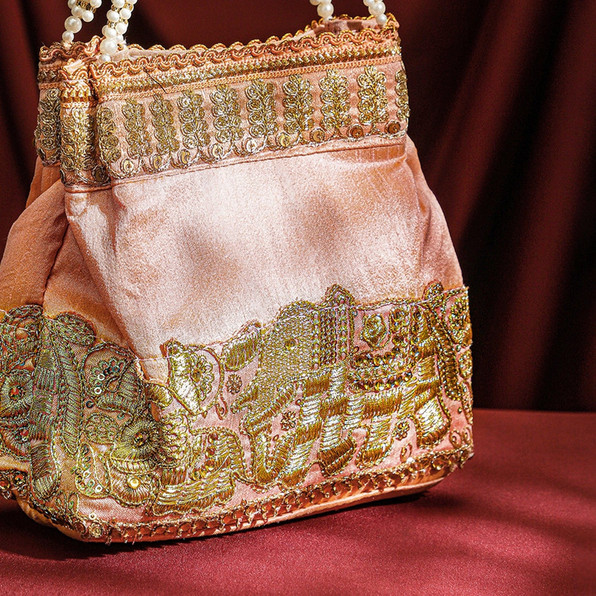 Rubans Handcrafted Peach Pink Silk Potli Bag with Pearl Handle & Gold Embroidered Elephant Motif フリーサイズ