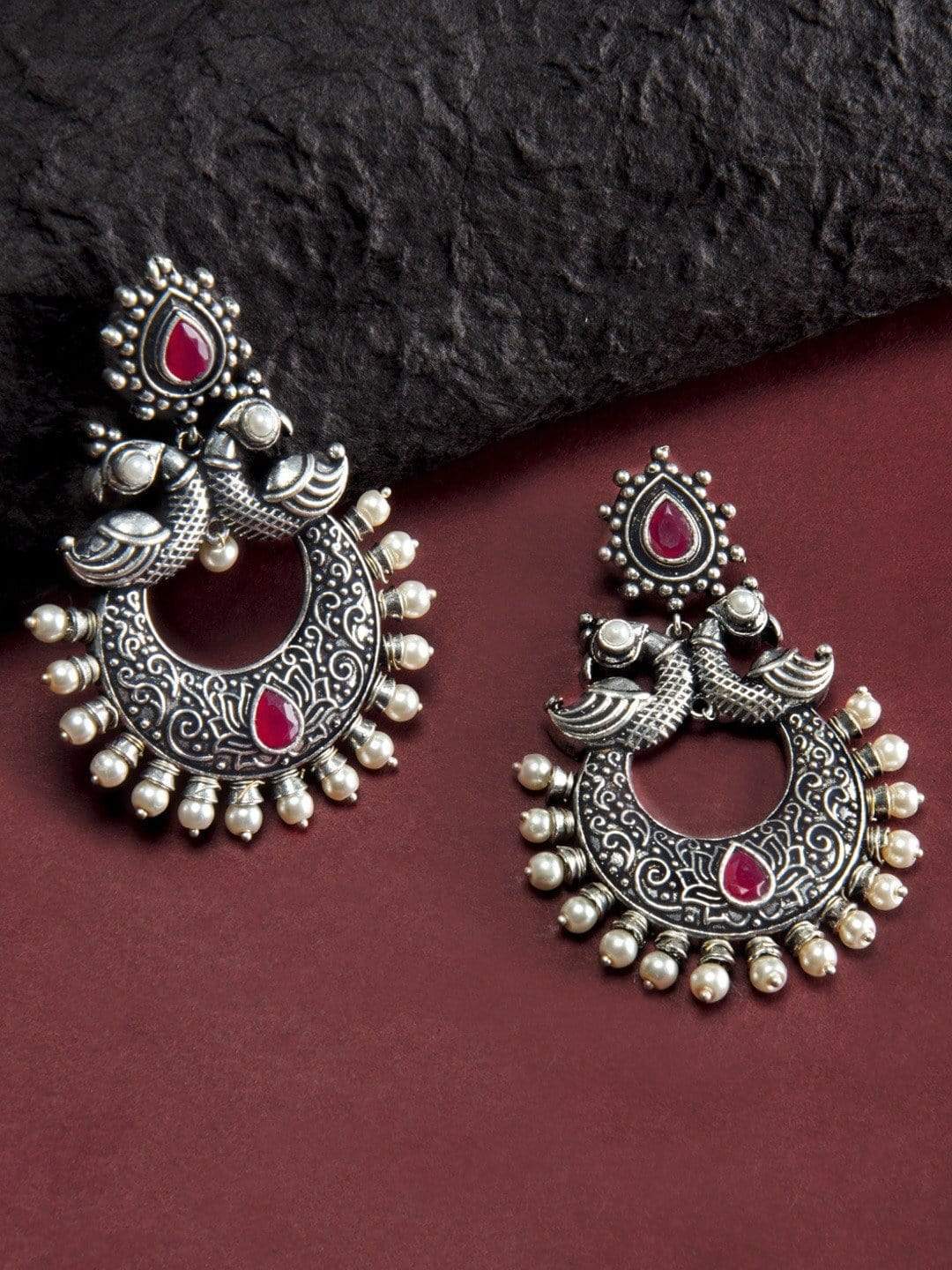 Rubans Silver Toned Faux Ruby Studded Oxidised Peacock Chandbali Earrings Silver