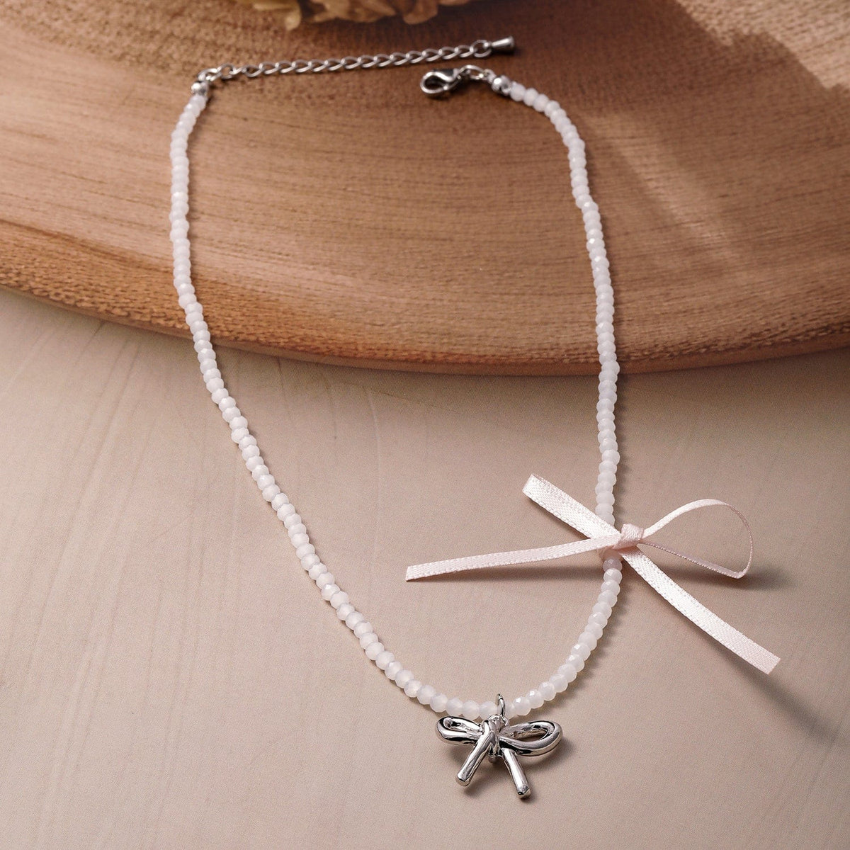 Chic Bow Pendant with Pearl & Ribbon Charm Silver