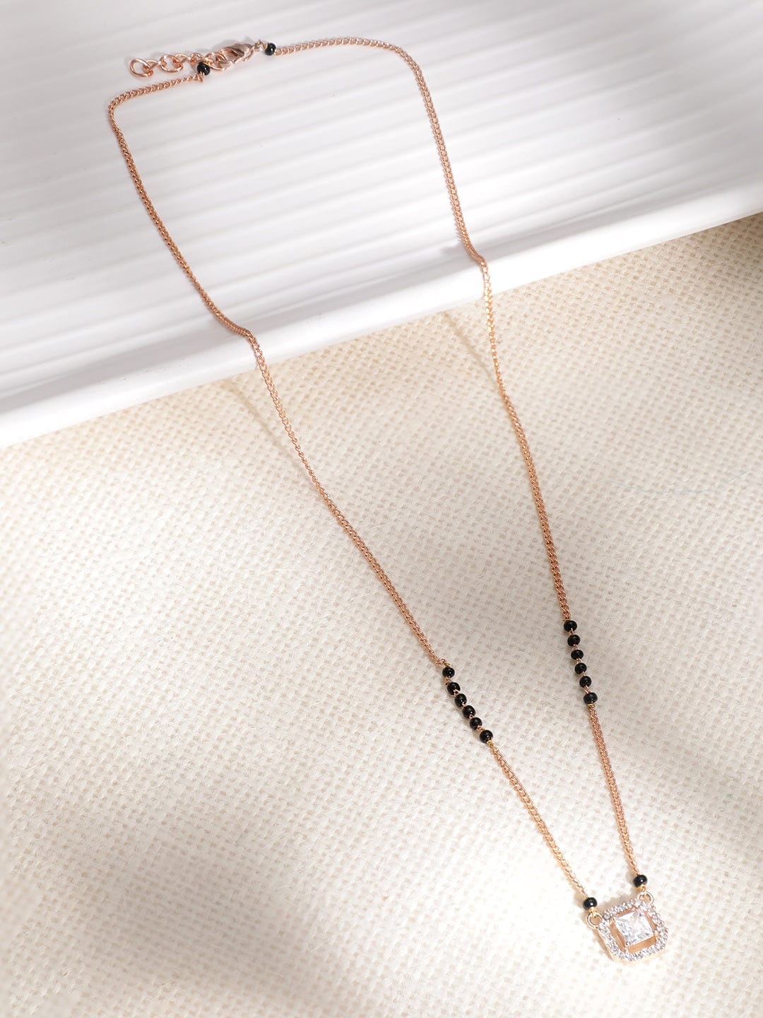 Women Rose Gold Plated CZ Stone Studded Black Beads Mangalsutra Gold