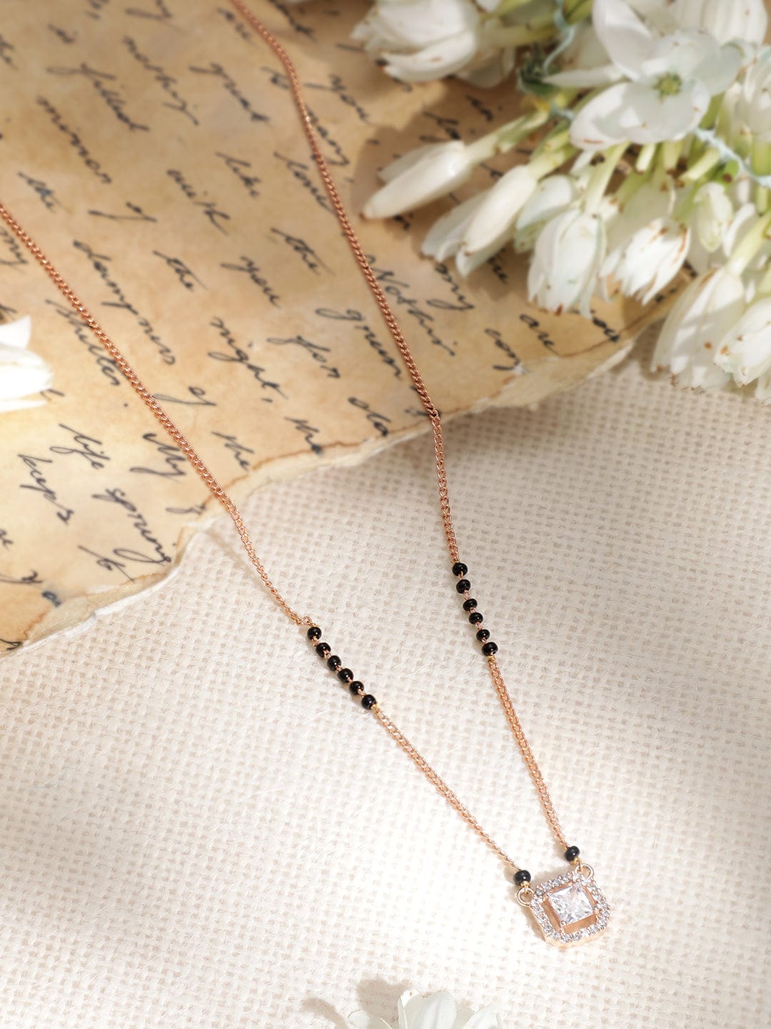 Women Rose Gold Plated CZ Stone Studded Black Beads Mangalsutra Gold