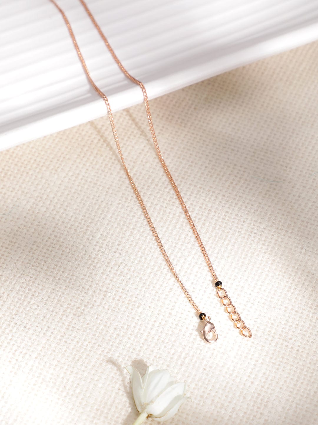 Women Rose Gold Plated CZ Stone Studded Black Beads Mangalsutra Gold